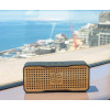 Haut-parleur solaire, haut-parleur portable sans fil Bluetooth en bambou et chargeur de téléphone par REVEAL - Conception en