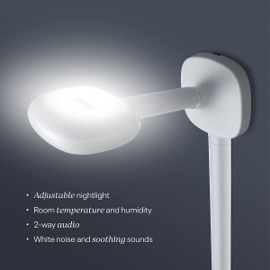 White phone with light and camera, similar to Advanced Nanit Pro Smart Baby Monitor with Floor Stand.