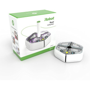 A green and white box being interacted with by iRobot Root rt0, a programmable STEM toy robot.