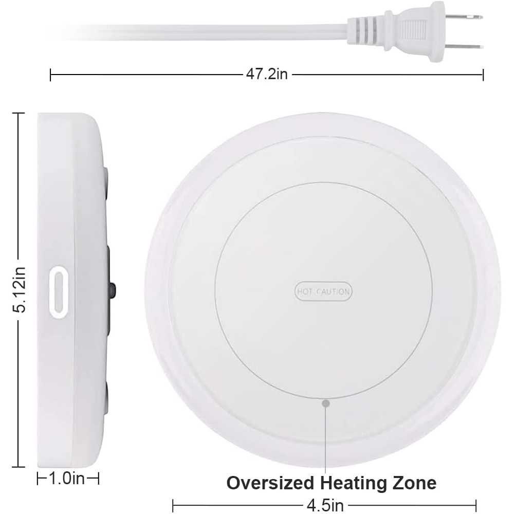 A white mug filled with latte art sits on a sleek white heating coaster, with steam rising from the cup.