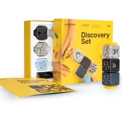 Colorful Cubelets Discovery Set with interactive blocks and guidebook on yellow background.